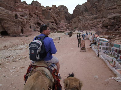 Riding out of Petra on a camel.jpg