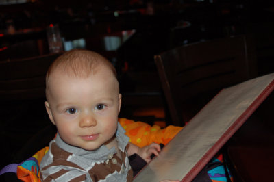 Liam checking out the menu at PF Changs