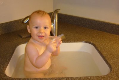 Liam playing in the sink