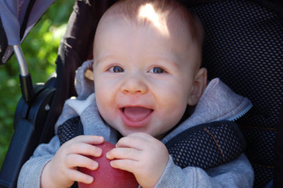 he's still happy even if he can't figure out how to eat the apple