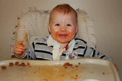 Liam eating his favorite, meatballs in spaghetti sauce