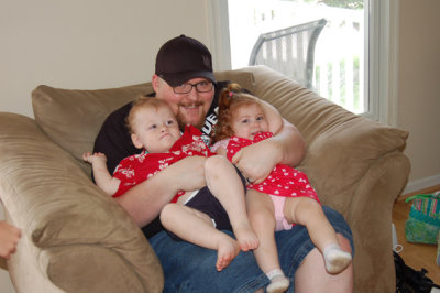 Uncle Rob and cousin Madison getting in some snuggle time with Liam