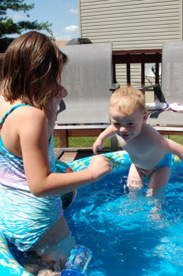 The girls joined Liam in his pool one day