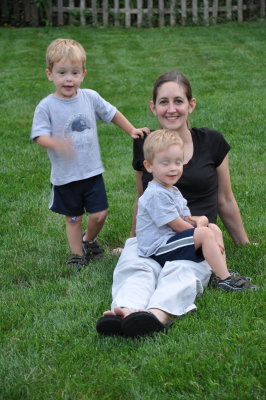 Anita and sons in backyard (Jersey)