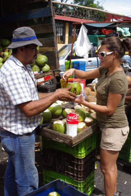 purchasing coconut drink