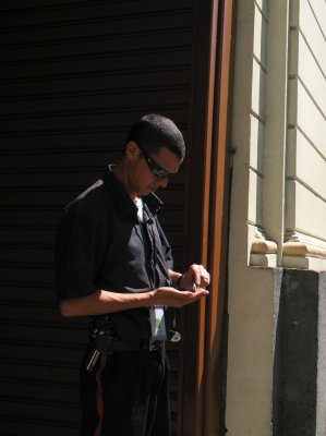 Armed Guard in black street clothes, Downtown San Jose, Costa Rica