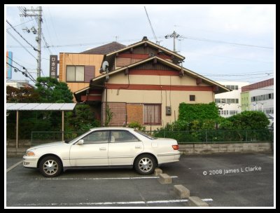 White Car and Old House