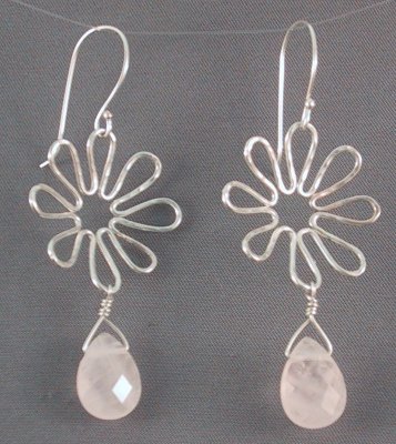 These sterling flower earrings have a Rose Quartz drop.  Each earring is approx 4.5 cm from top of flower to bottom of drop.