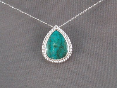 This gem silica pendant is approximately 18 x 23 mm in size. Sold