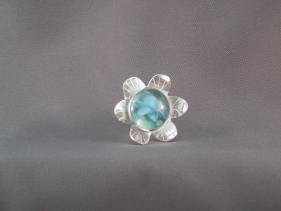 Front view of the flower ring, size 8.5.  The 'stone' in the centre is a flattened marble! SOLD