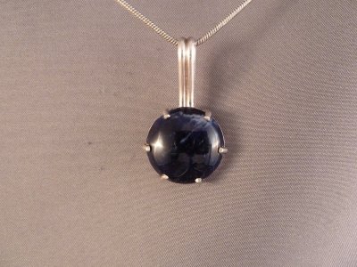 Sterling silver and sodalite.
