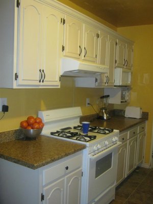 Kitchen Cabinets, Counter Tops and New Floors