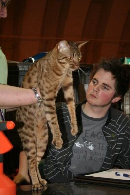 and the judge pupil is feeling the coat..