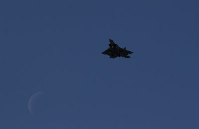 F22 over the moon