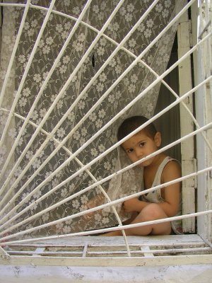 Baku - narrow street - boy in the window