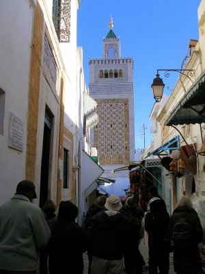 Tunis Medina street with Zitouna mosque minaret