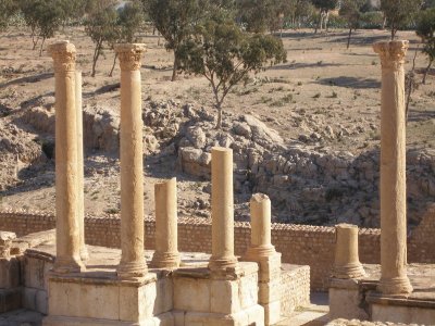 Sbeitla - amphitheatre columns - note rugged setting