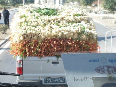 Seen leaving Sbeitla... carrots & leeks (or onions) on the way to market