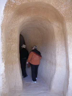 Long tunnel into interior dug-out rooms off interior courtyard