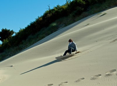 Sand dune surfing