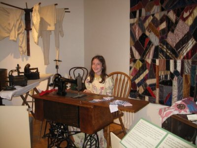 Savanna demonstrating the sewing machine