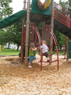 Liana and Adam on the jungle gym