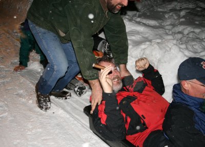 Everyone participates in sledding - bodies everywhere