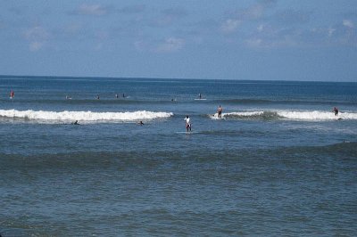 Squadron of long paddle surfers