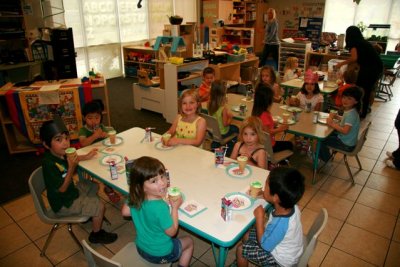 Twins' birthday party in classroom