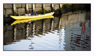 Kayak and reflection