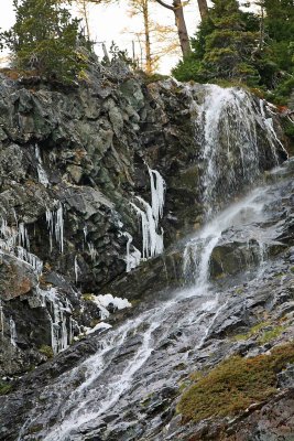 Waterfalls Cascading Down Valley Showing Signs Of Winter