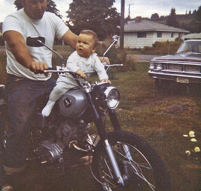 Jason Riding 1966 Honda 160cc Motorcycle ( Ford Failane In Backdrop