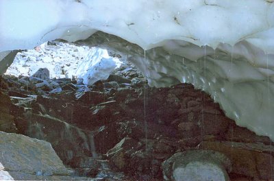 Snow Cave  With Creek, Glacier National Park