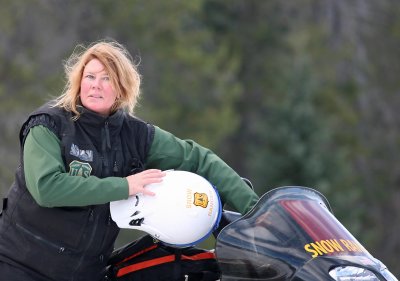  Snowmobile Ranger Gal Helps Keep Course  Safe 