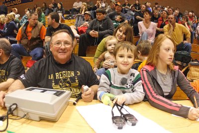 Randy Arnold Working  Scoreboard At Wrestling Touney With HIs Grandsons , Daughter And, NIece 