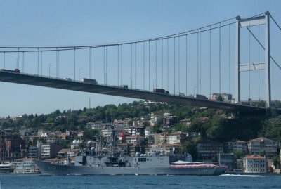Frigate F494 passing under Fatih Bridge also linking Europe and Asia