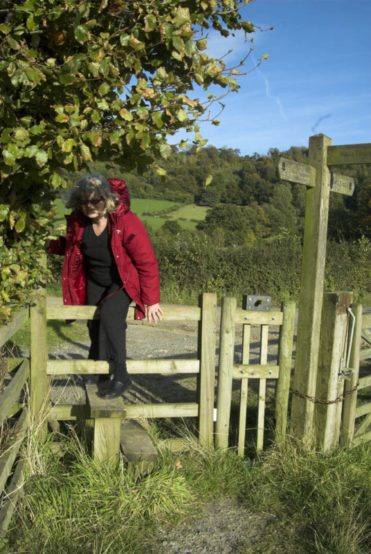 Climbing a stile on the Cotswold Way