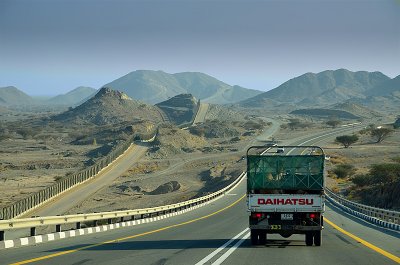 Driving the camel along the border of Oman