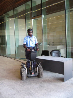 Security travel around campus on two wheeled Segway bikes