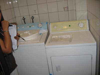 Washer & dryer. My housing contract says that this place is temporary till they build a larger one for me -- if I want to move.