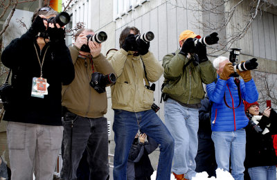 Photojournalists in action