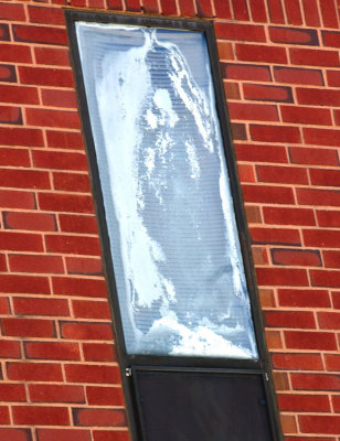The Virgin Mary in a Window