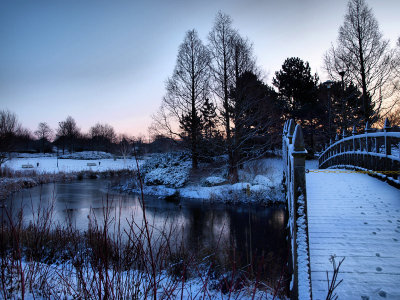 Winter Lake and Snow Covered Bridge