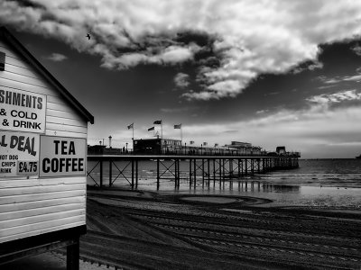 Beach Hut and Pier in Black and White