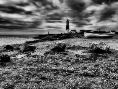 Boat and Rocks at Portland Bill Lighthouse in Black and White
