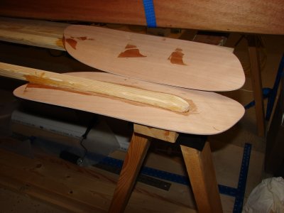 The paddles are glued up with curved blades