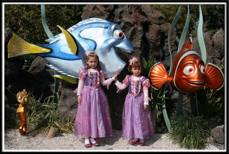 Every year the kids take their picture with Dory and Nemo.