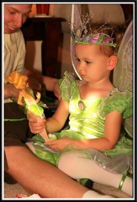 Kylie gets a Tinkerbell doll from Mommy
