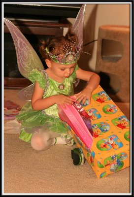 Kylie opens her presents from Grammy Charlotte and Grampy Leo