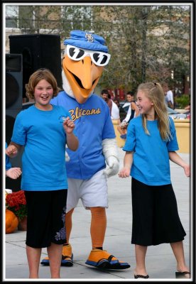 Blue Pan Jam kids with the Pelican mascot